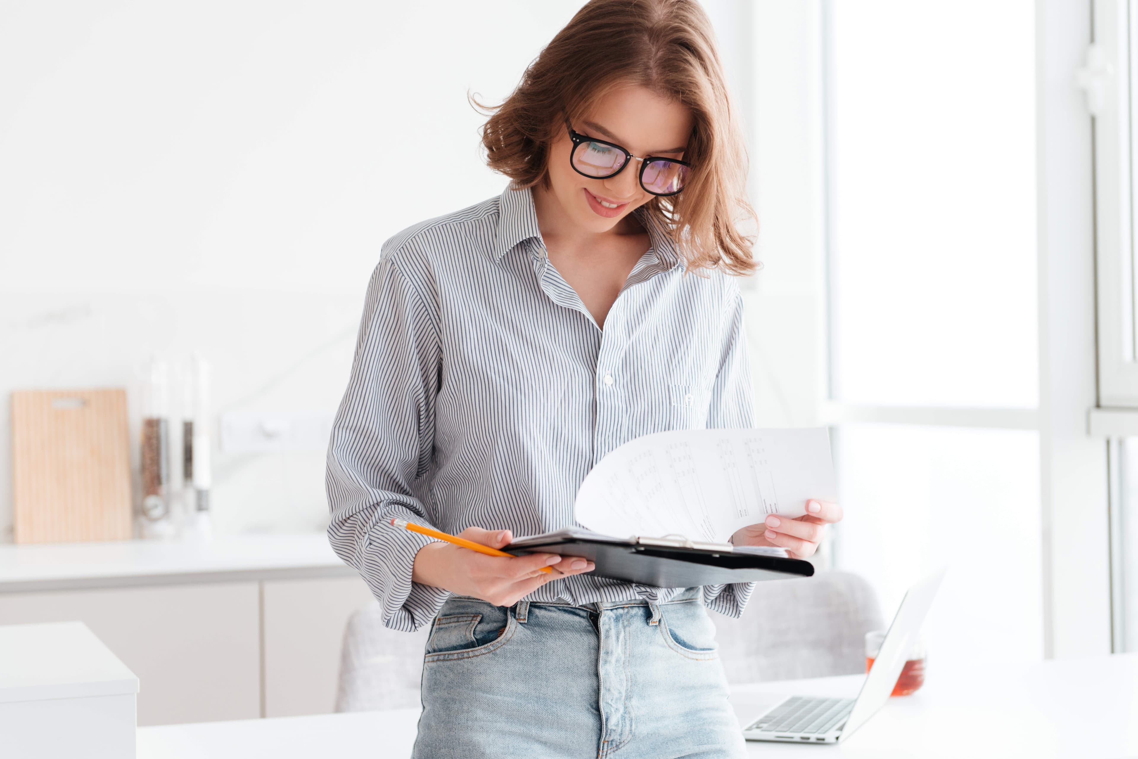 Therapist handling ABA insurance paperwork and documentation